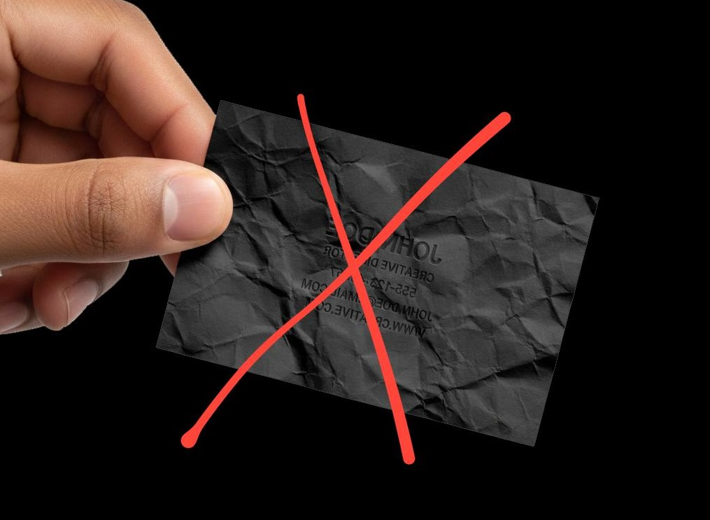 Crumpled, faded paper business card